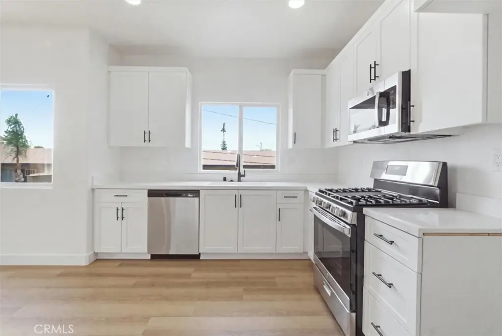 Townhouse for sale at 521 N Lark Ellen B, Covina, CA featuring 3 beds and 3 baths