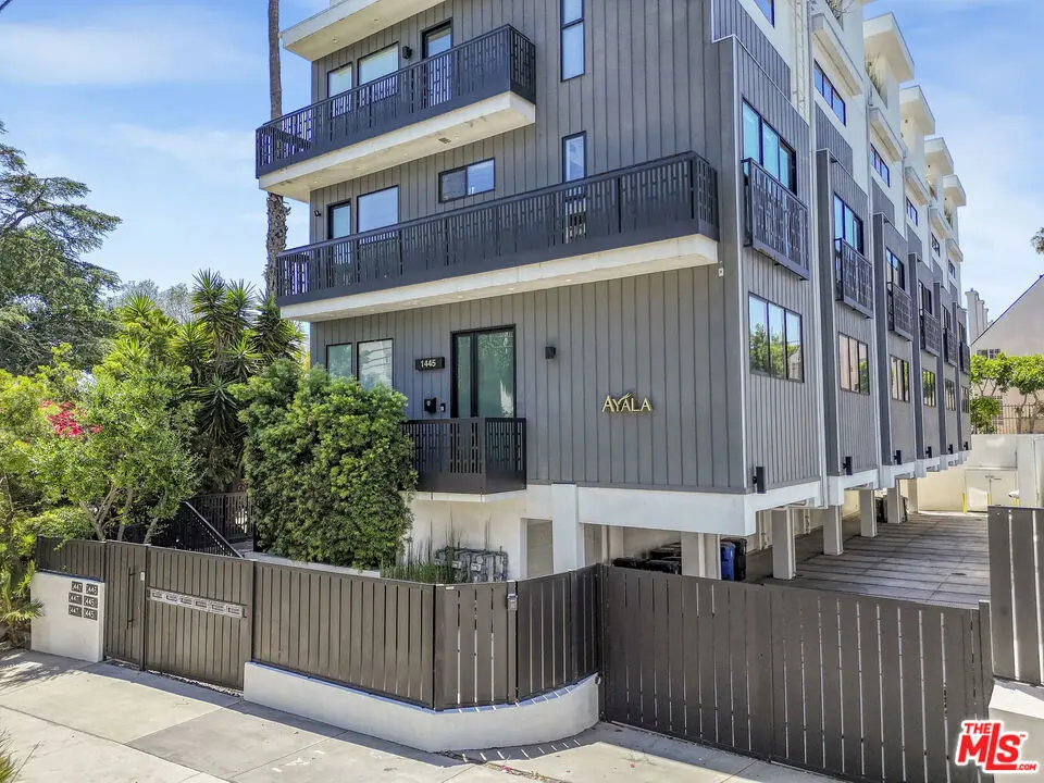 Townhouse for sale at 1445 1/4 N Martel Avenue, Los Angeles, CA featuring 3 beds and 3 baths
