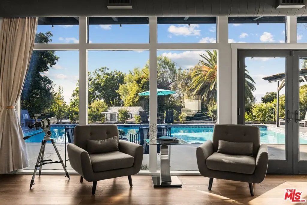 Single Family Residence for sale at 22505 Macfarlane Drive, Los Angeles, CA featuring 4 beds and 3 baths