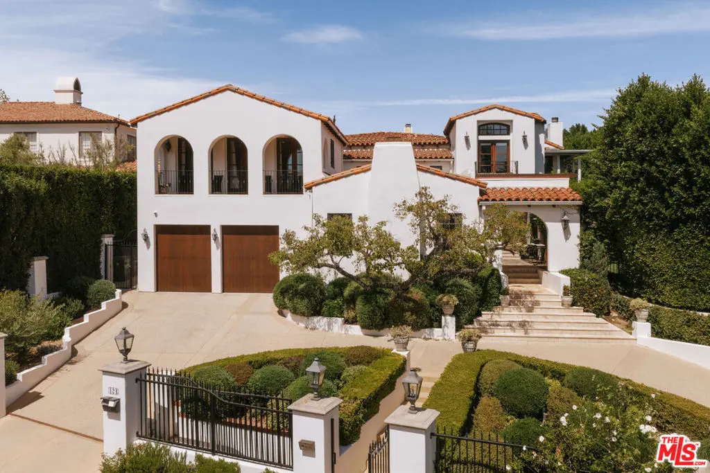 Single Family Residence for sale at 124 N Woodburn Drive, Los Angeles, CA featuring 6 beds and 9 baths