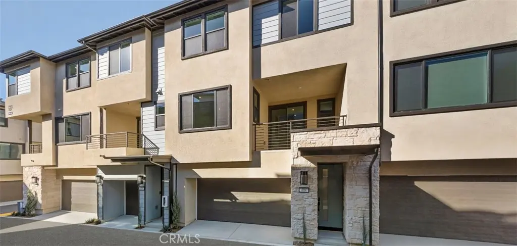 Townhouse for sale at 107 S Laxore Street 404, Anaheim, CA featuring 2 beds and 3 baths