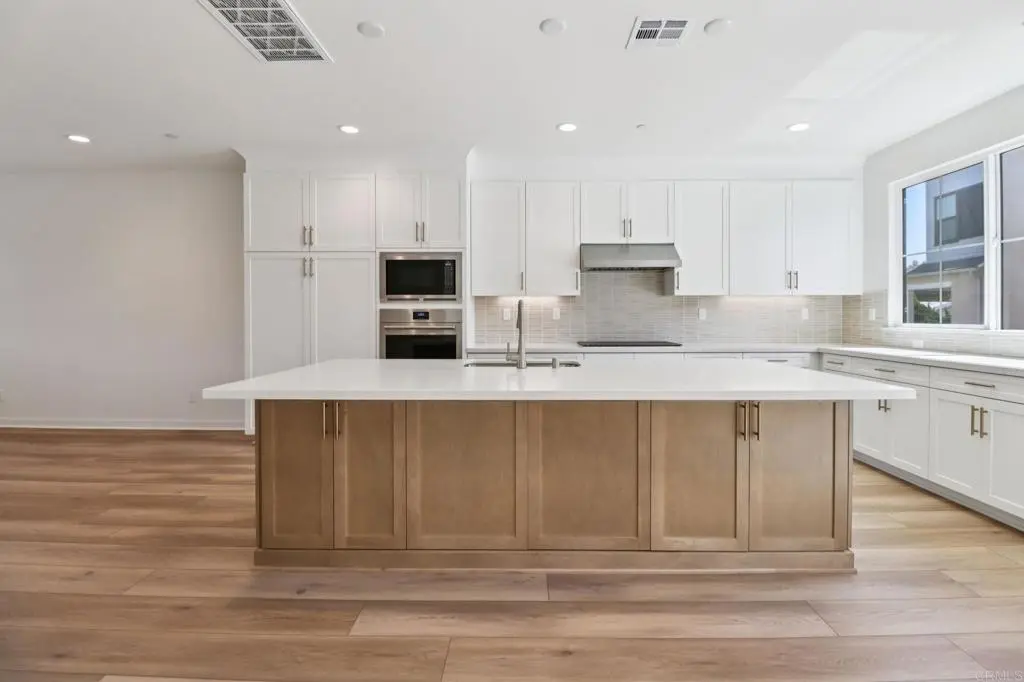 Townhouse for sale at 4942 Spirea Way, Carlsbad, CA featuring 4 beds and 4 baths