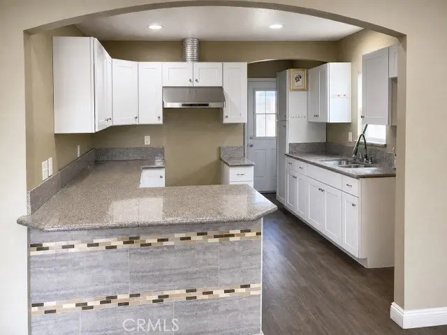 Duplex for sale at 344 E 81st Street, Los Angeles, CA featuring 4 beds and 2 baths