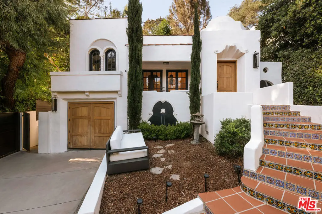 Single Family Residence for sale at 8061 Woodland Lane, Los Angeles, CA featuring 3 beds and 2 baths