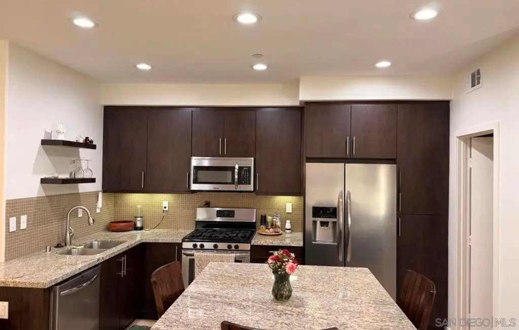 Townhouse for sale at 2230 Indus Way, San Marcos, CA featuring 2 beds and 3 baths