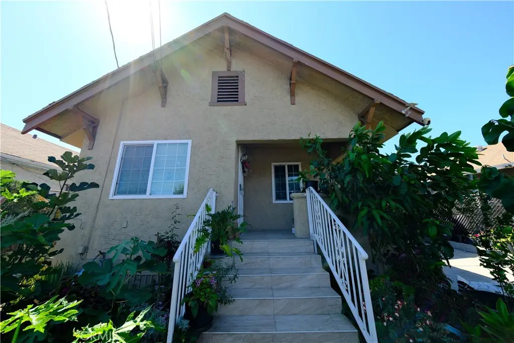 Single Family Residence for sale at 953 S Hollins Street, Los Angeles, CA featuring 5 beds and 2 baths