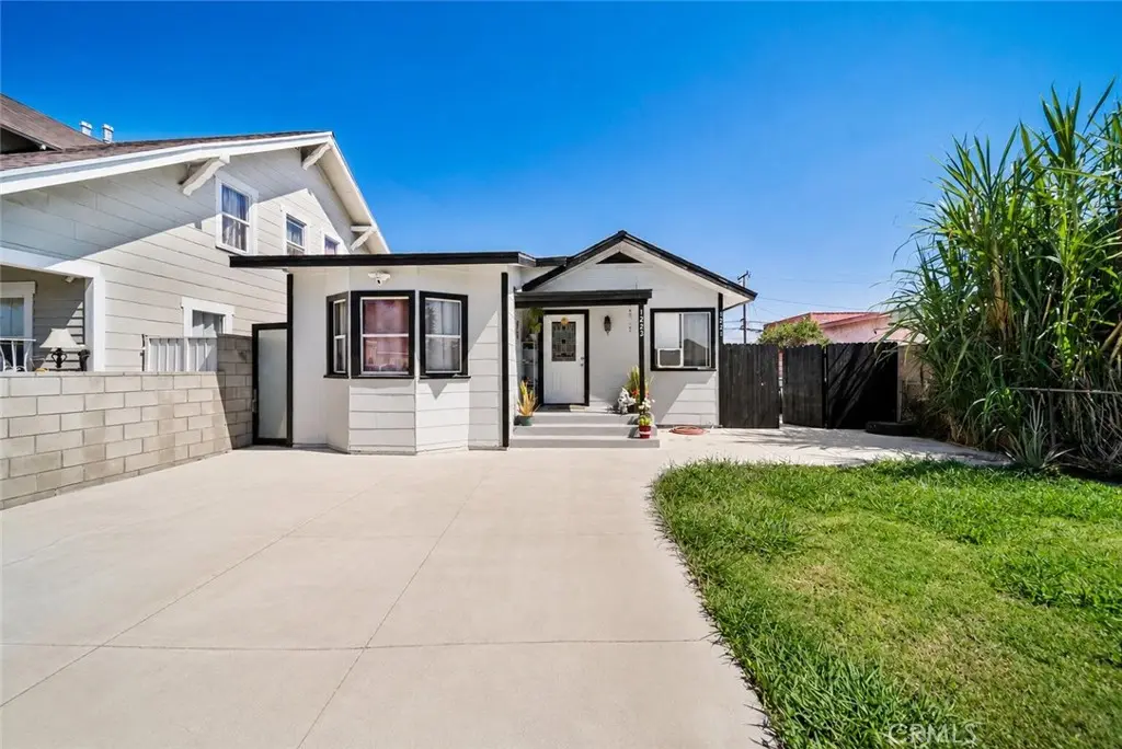 Triplex for sale at 1221 W 88th, Los Angeles, CA