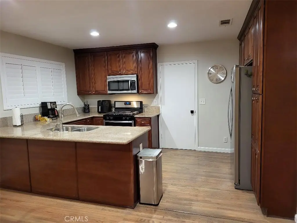 Residential Lease for rent at 7951 Devenir, Downey, Los Angeles County, CA featuring 3 beds and 2 baths