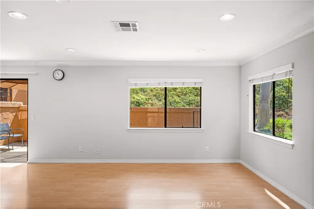 Townhouse for sale at 1450 Kauai Street, West Covina, CA featuring 2 beds and 3 baths