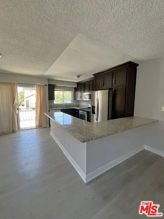 Condominium for rent at 905 S Bedford Street 5, Los Angeles, CA featuring 3 beds and 2 baths