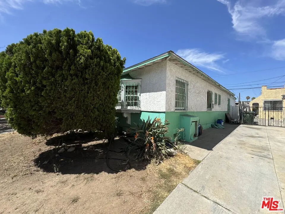 Single Family Residence for sale at 1725 S Highland Avenue, Los Angeles, CA featuring 3 beds and 2 baths