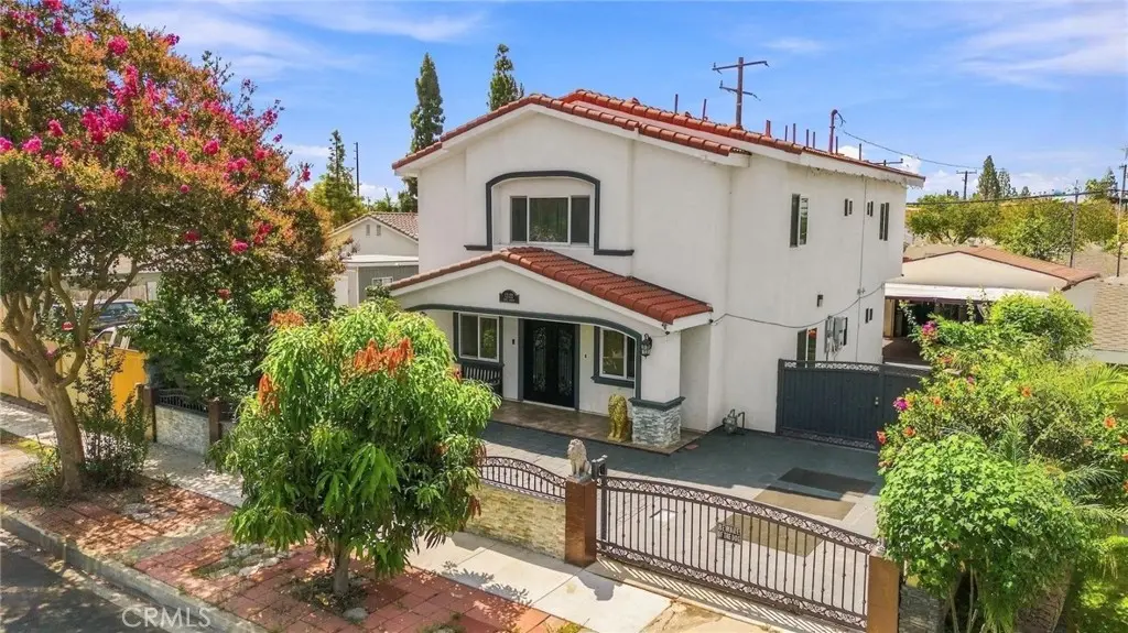 Single Family Residence for sale at 12122 207th, Lakewood, CA featuring 4 beds and 5 baths