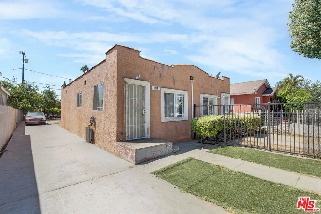 Residential Income for sale at 1208 E 74th Street, Los Angeles, CA featuring 3 beds and 2 baths