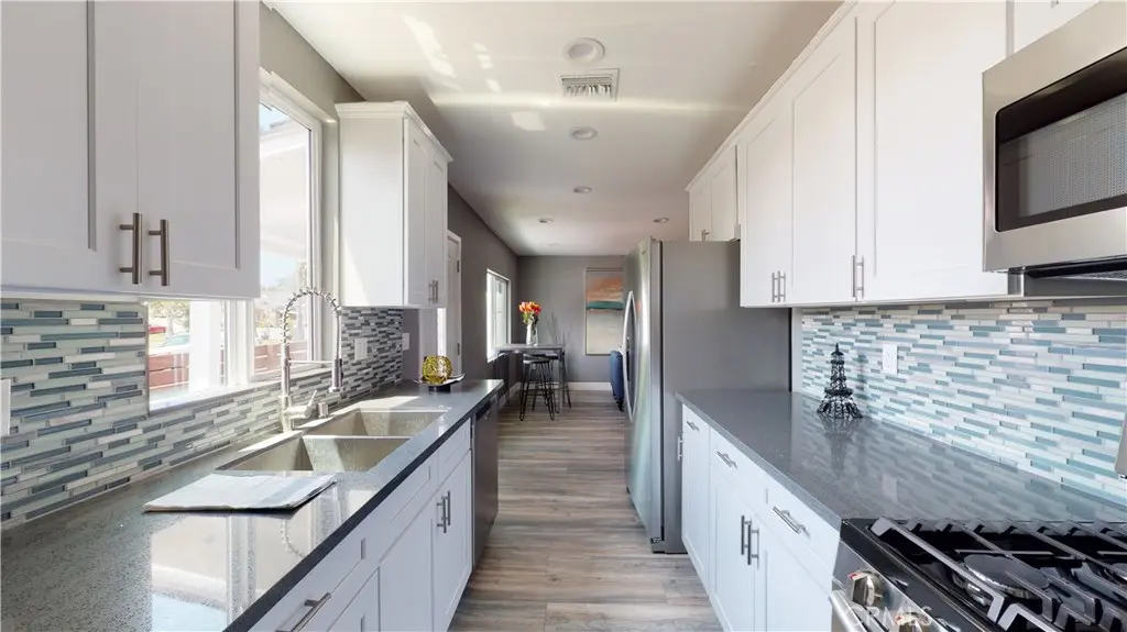 Duplex for sale at 1939 W 36th Place, Los Angeles, CA featuring 6 beds and 4 baths