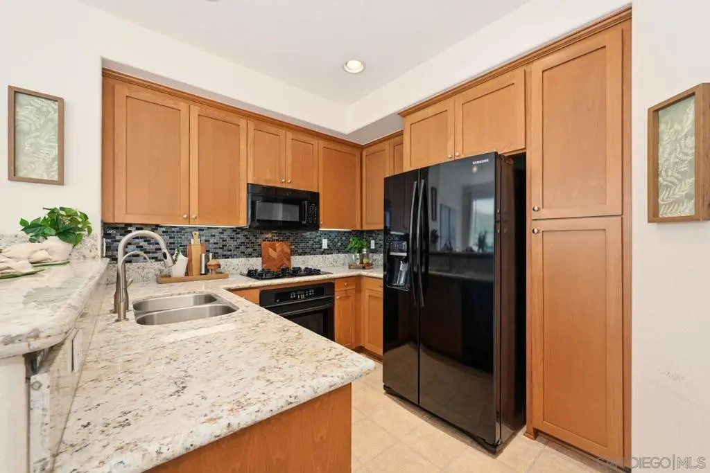 Townhouse for sale at 4611 Central Plaza, San Diego, CA featuring 2 beds and 3 baths