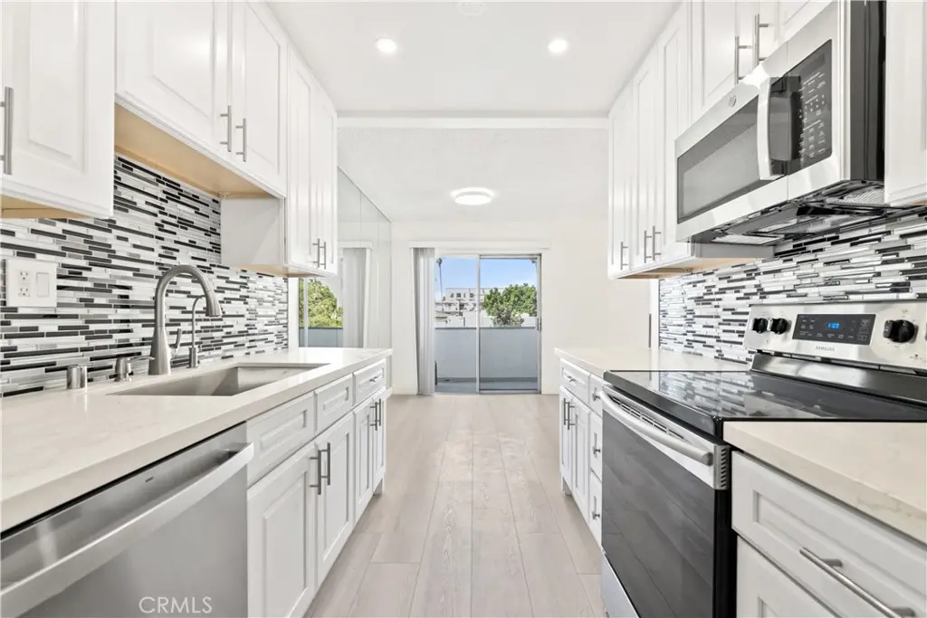 Condominium for rent at 1344 N Martel Avenue 302, Los Angeles, CA featuring 2 beds and 2 baths