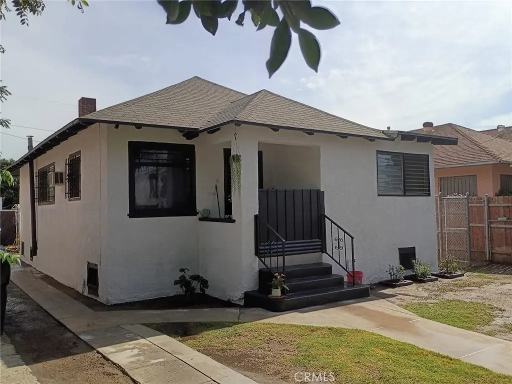 Single Family Residence for sale at 1580 E 45th Street, Los Angeles, CA featuring 4 beds and 2 baths