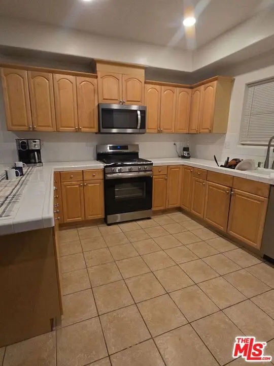 Condominium for rent at 17144 Chatsworth Street, Los Angeles, CA featuring 2 beds and 3 baths