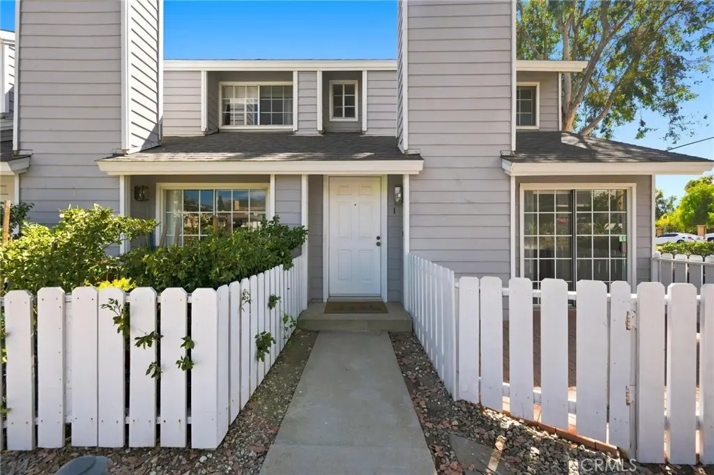 Townhouse for sale at 14380 Foothill Blvd 1, Los Angeles, CA featuring 2 beds and 3 baths