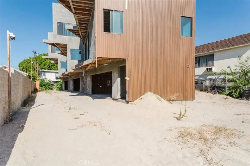 Triplex for sale at 6651 Camellia Avenue, Los Angeles, CA featuring 9 beds and 6 baths