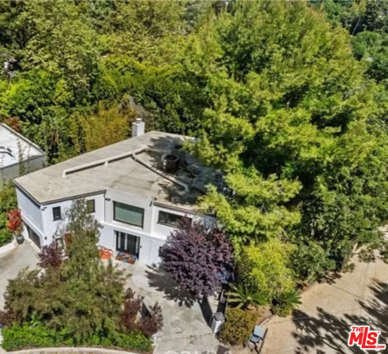 Single Family Residence for sale at 7670 Woodrow Wilson Drive, Los Angeles, CA featuring 4 beds and 4 baths