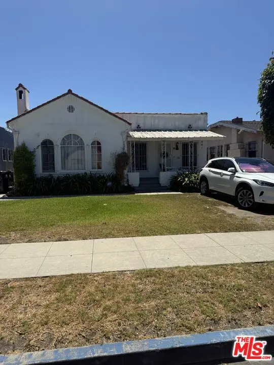 Residential Income for sale at 1922 W 39th Place, Los Angeles, CA featuring 4 beds and 2 baths