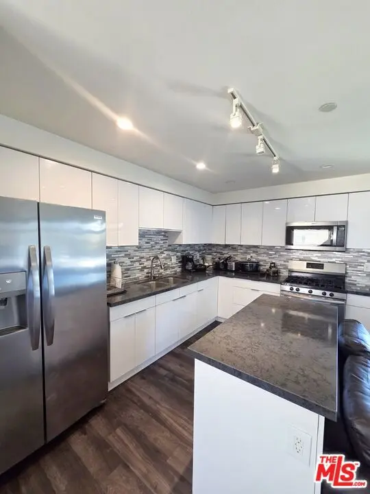 Residential Lease for rent at 2651 S Hobart Blvd 1, Los Angeles, Los Angeles County, CA featuring 4 beds and 3 baths
