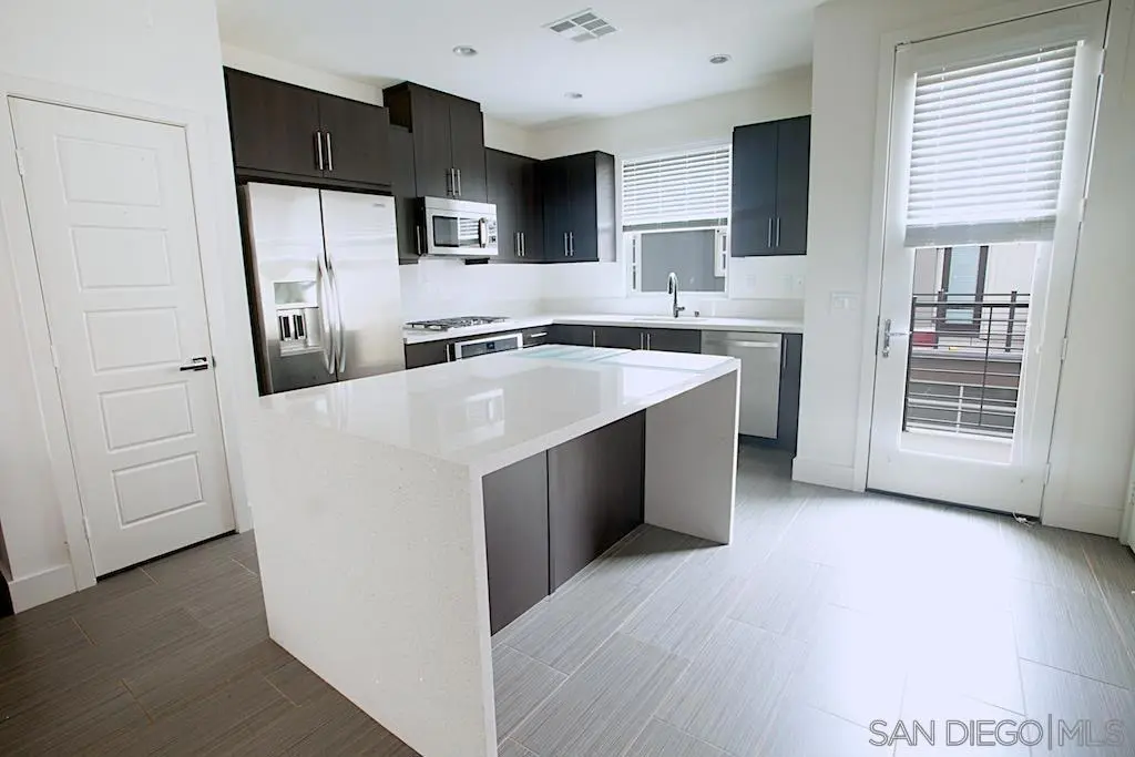 Townhouse for sale at 7841 Inception Way, San Diego, CA featuring 3 beds and 4 baths