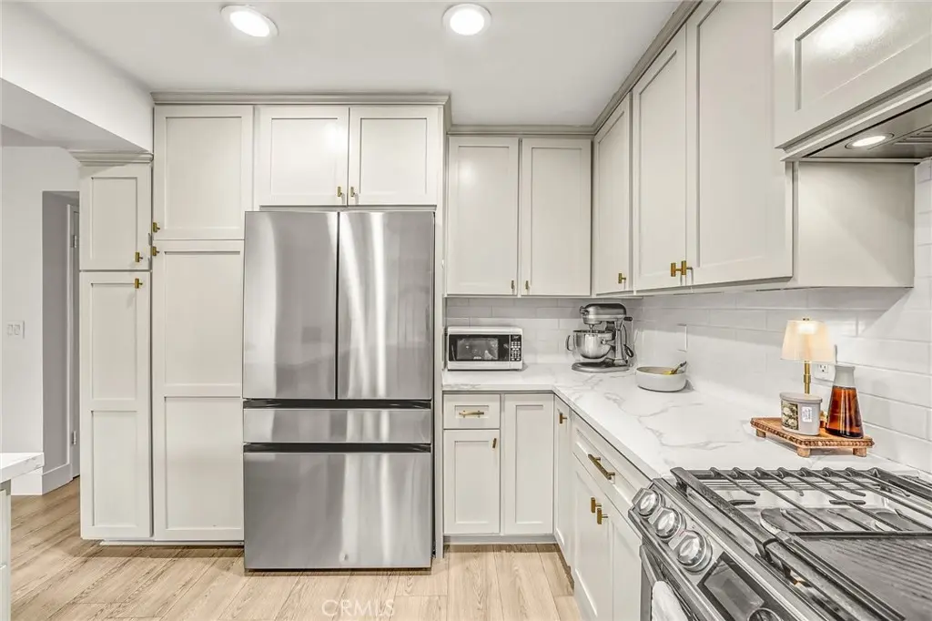 Townhouse for sale at 5950 Imperial Highway 91, South Gate, CA featuring 3 beds and 3 baths