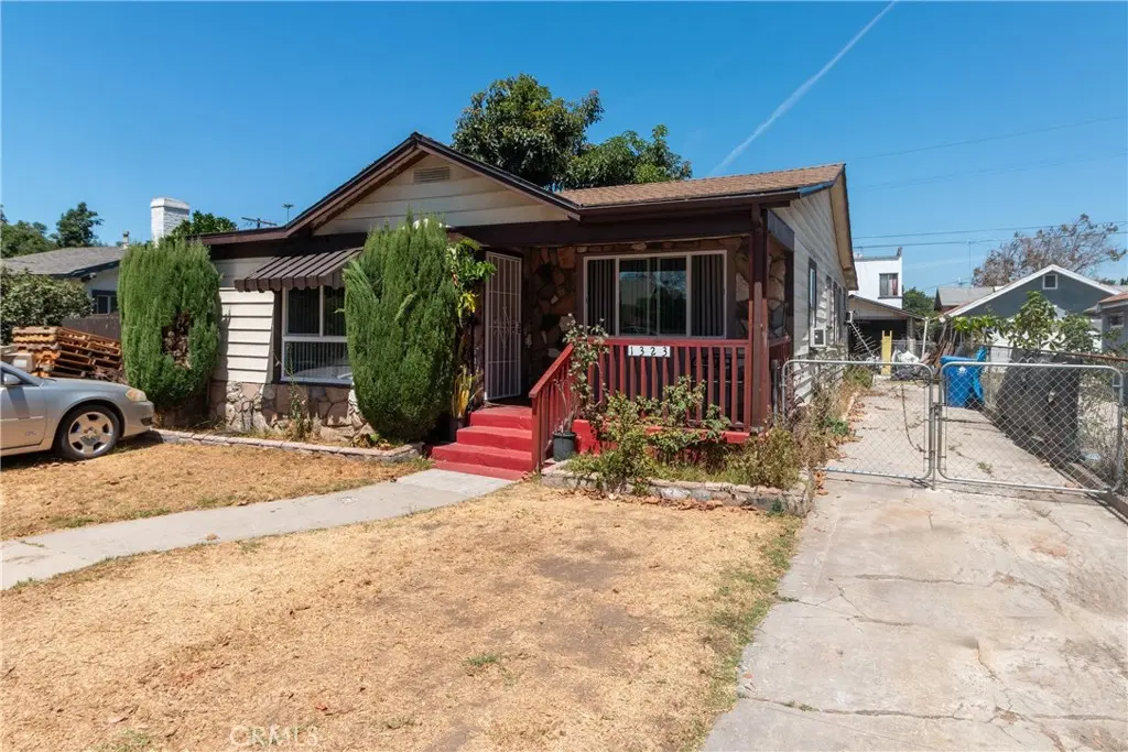 Single Family Residence for sale at 1321 W 60th, Los Angeles, CA featuring 4 beds and 2 baths