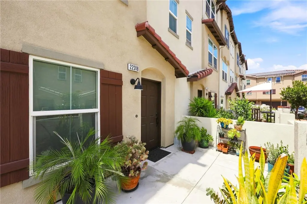 Townhouse for sale at 22318 Lily Ct, Torrance, CA featuring 4 beds and 4 baths