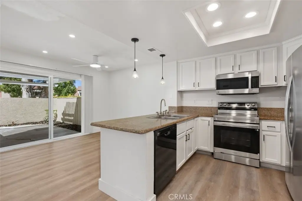 Townhouse for rent at 142 Stanford Court 71, Irvine, CA featuring 3 beds and 3 baths