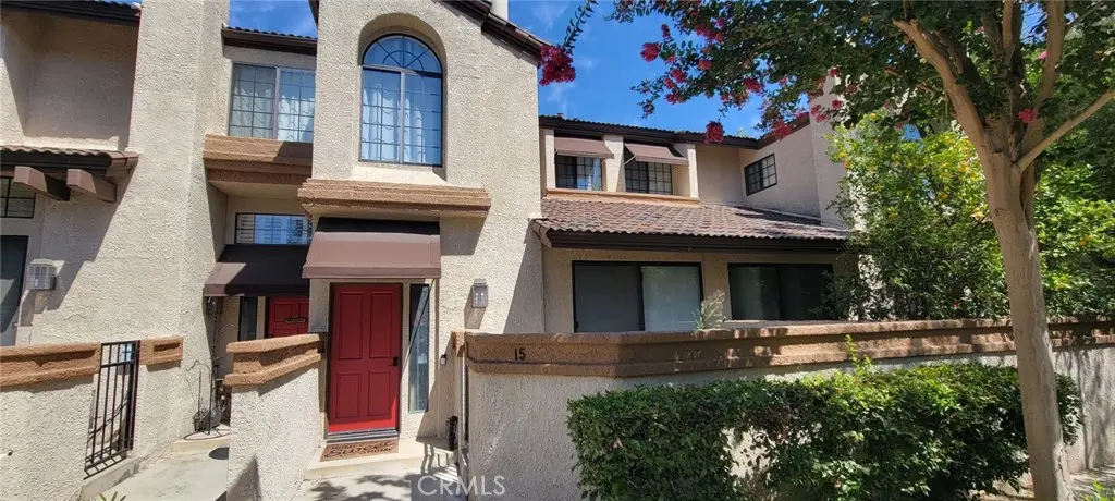 Townhouse for sale at 15 Rock Cliff Place, Pomona, CA featuring 2 beds and 3 baths