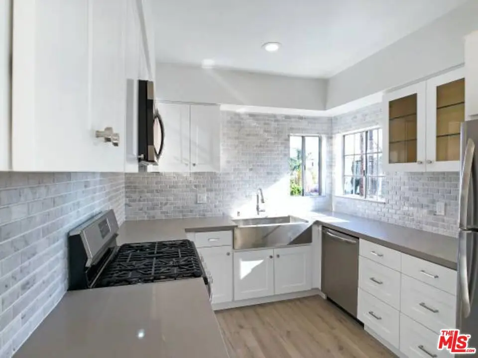 Condominium for rent at 4407 AMBROSE Avenue 105, Los Angeles, CA featuring 3 beds and 2 baths