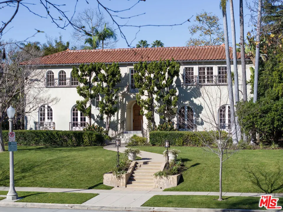 Single Family Residence for sale at 441 S Muirfield Road, Los Angeles, CA featuring 7 beds and 5 baths
