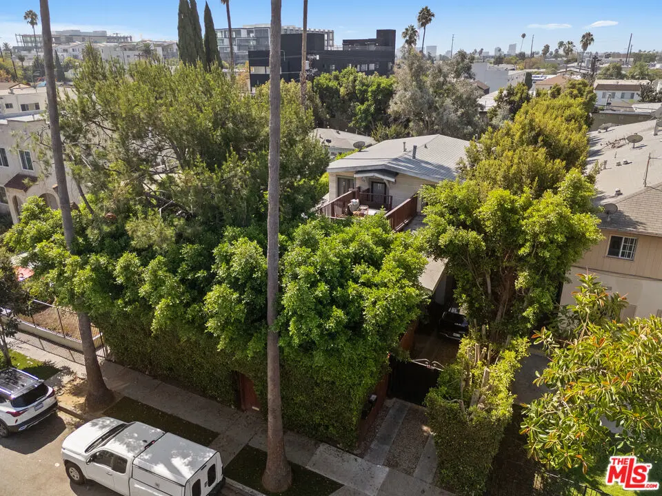 Residential Income for sale at 5742 La Mirada Avenue, Los Angeles, CA featuring 4 beds and 2 baths