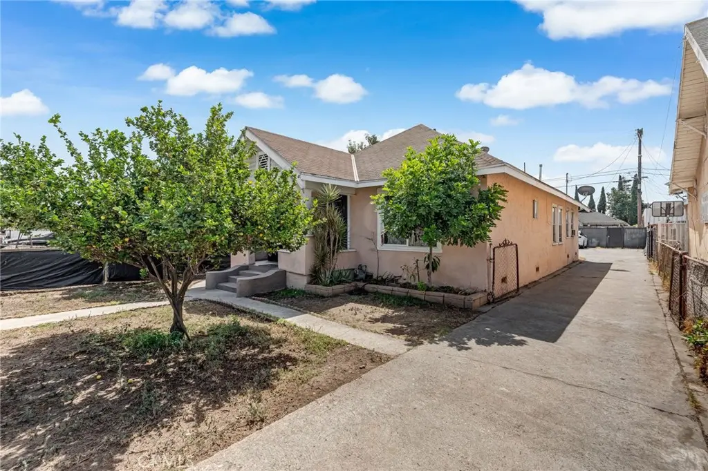 Single Family Residence for sale at 1302 E 48th Place, Los Angeles, CA featuring 4 beds and 3 baths