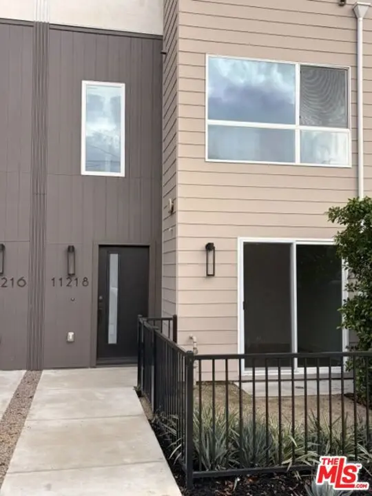Townhouse for sale at 11218 W Victory Boulevard 4, Los Angeles, CA featuring 3 beds and 4 baths