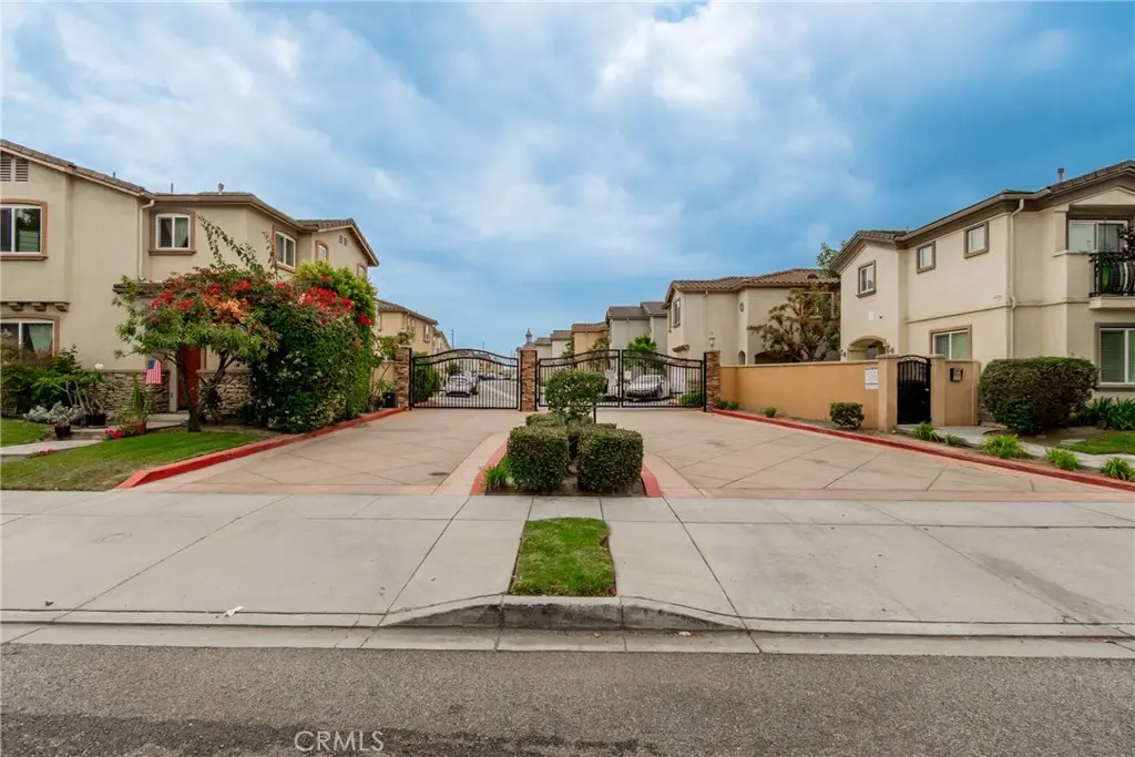 Townhouse for rent at 8306 Telegraph, Downey, CA featuring 4 beds and 3 baths