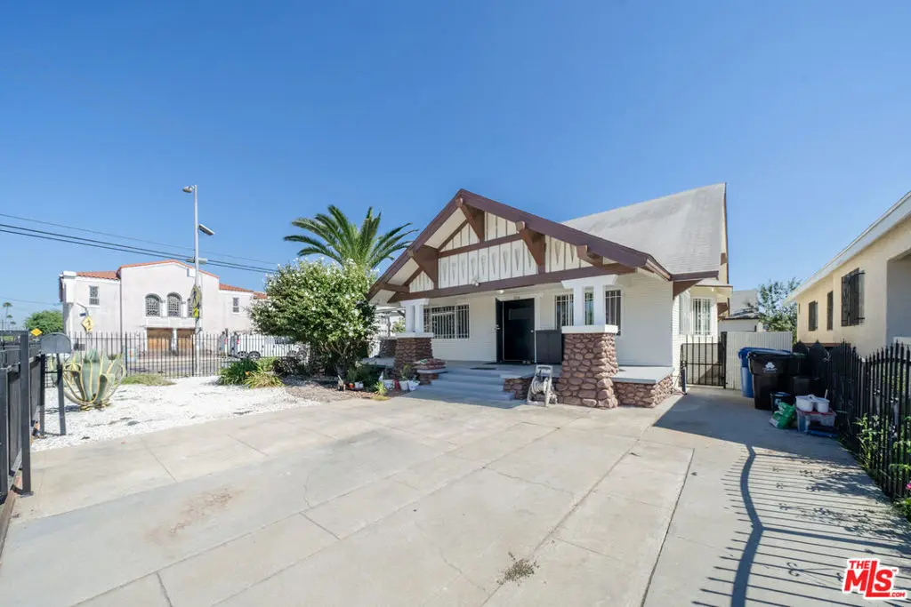Single Family Residence for sale at 804 W 55th Street, Los Angeles, CA featuring 4 beds and 2 baths