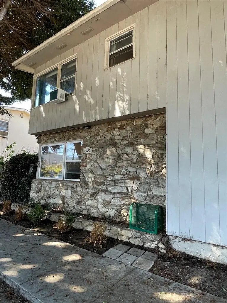 Townhouse for sale at 1035 E Appleton Street 2, Long Beach, CA featuring 2 beds and 1 bath