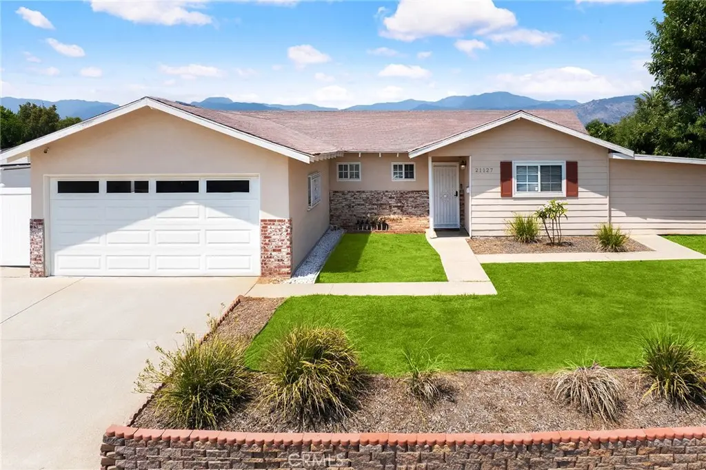 Single Family Residence for sale at 21127 E Cypress Street, Covina, CA featuring 4 beds and 2 baths