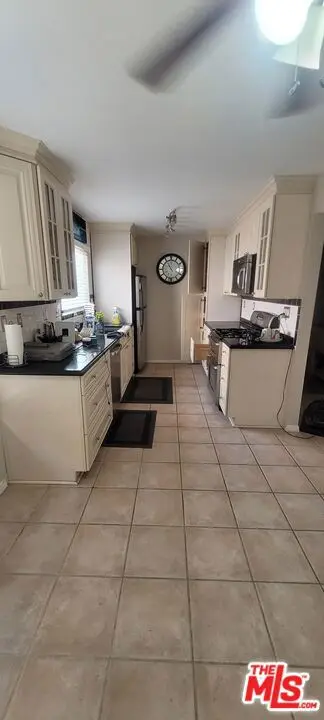 Condominium for sale at 6908 Remmet Avenue 8, Los Angeles, CA featuring 2 beds and 3 baths