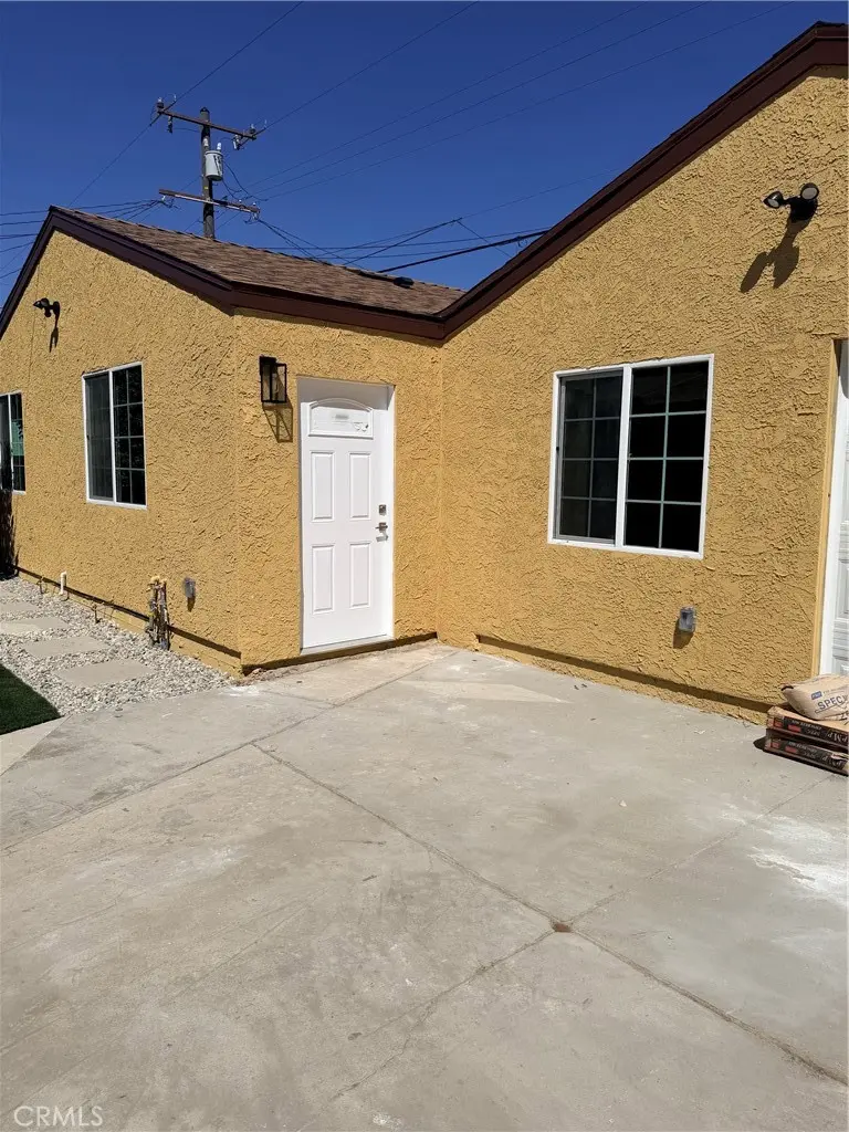 Single Family Residence for rent at 9314 Bryson B, South Gate, CA featuring 2 beds and 2 baths