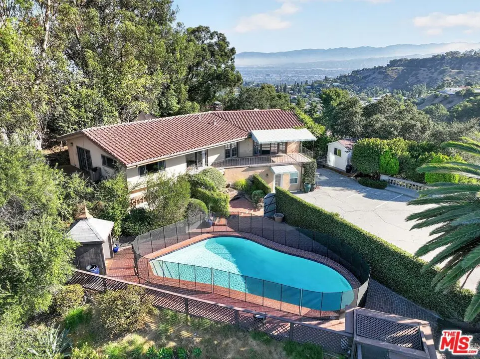 Single Family Residence for sale at 8207 Mulholland Drive, Los Angeles, CA featuring 4 beds and 3 baths