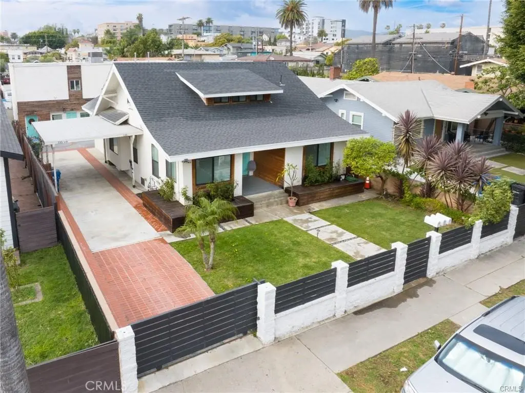 Triplex for sale at 135 N Vendome Street, Los Angeles, CA featuring 7 beds and 5 baths