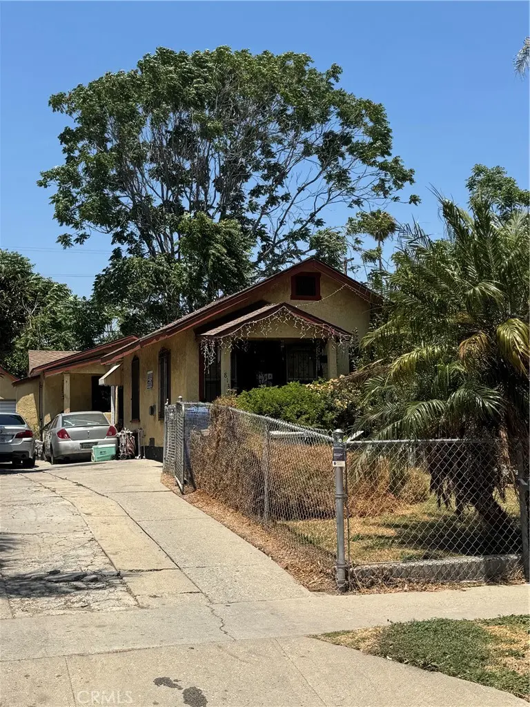 Duplex for sale at 811 East 113th Street, Los Angeles, CA featuring 3 beds and 2 baths