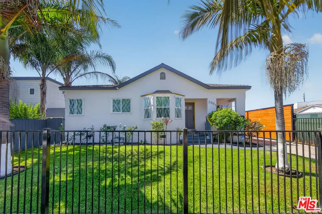Single Family Residence for sale at 2001 S Spaulding Avenue, Los Angeles, CA featuring 4 beds and 4 baths