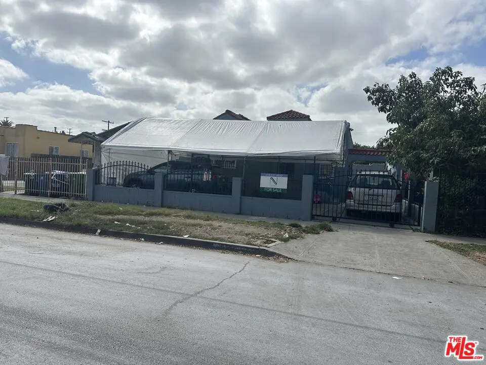 Residential Income for sale at 822 E 84th Place, Los Angeles, CA featuring 6 beds and 4 baths