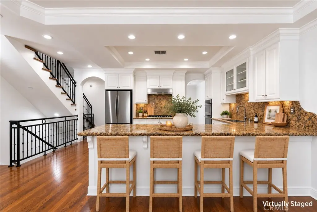 Townhouse for sale at 1551 Artesia Boulevard 4, Manhattan Beach, CA featuring 3 beds and 3 baths